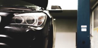 Vehicle maintenance a black car in a service station