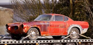 Basic information and principles of paintless dent removal technology red-coupe-on-flatbed-trailer0