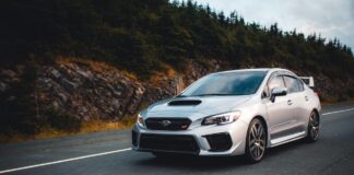 Where to Put a Car Tracker silver-subaru-car-driving-down-the-road