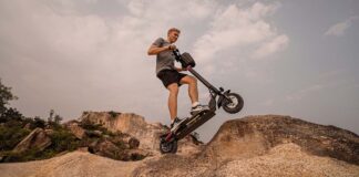 Interesting Option For Off-Road Transport person standing on circooter bike