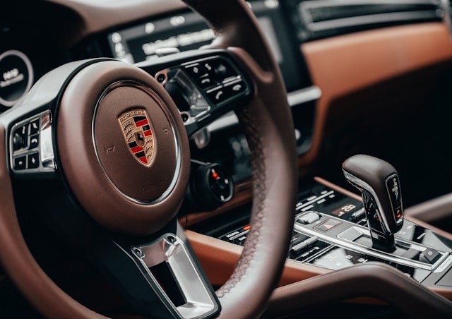 black-and-brown-porsche-steering-wheel