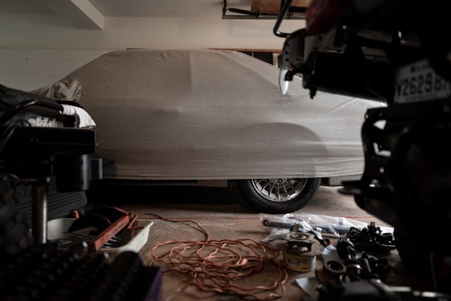 covered car in garage