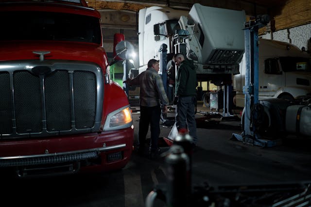 auto-mechanic-working-on-car-shop